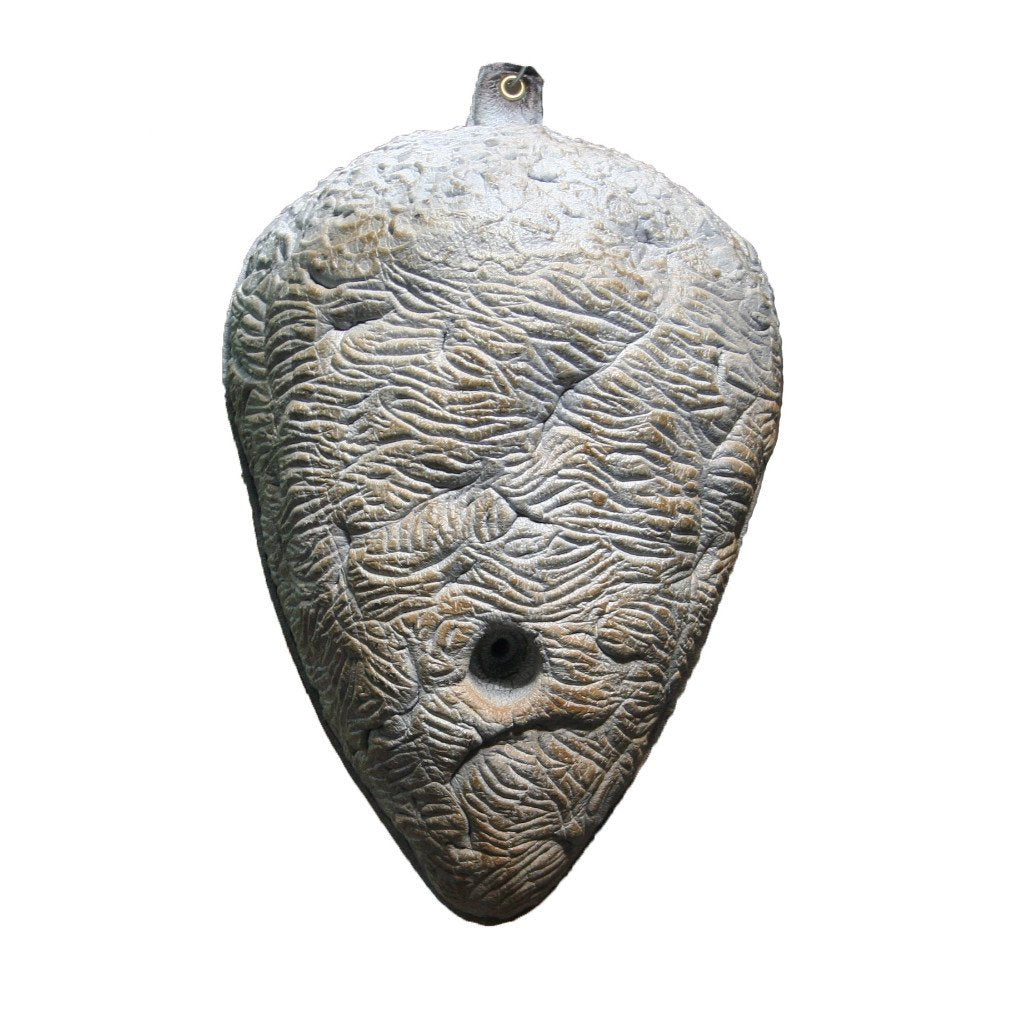 Fake wasp nest deterrent hanging outdoors to repel wasps naturally without chemicals