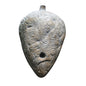 Fake wasp nest deterrent hanging outdoors to repel wasps naturally without chemicals